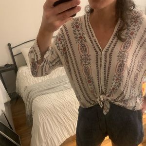 Button down, white printed shirt.